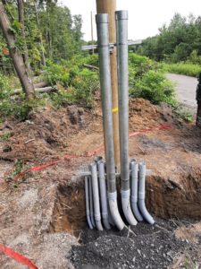 Neal-Lynn conduit installation for underground utilities
