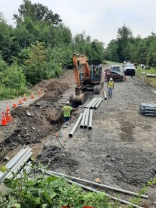 Neal-Lynn laying pipe for utility company